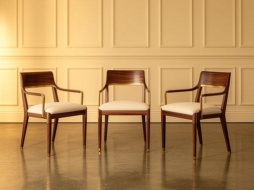 Set of walnut dining chairs with cream linen seats